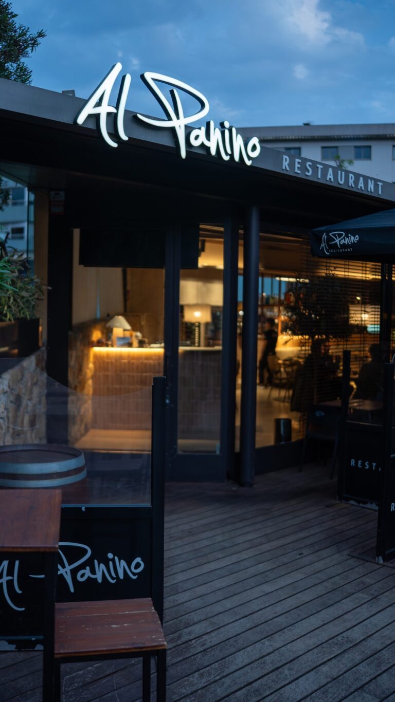 The entrance and terrace of Al Panino at dusk